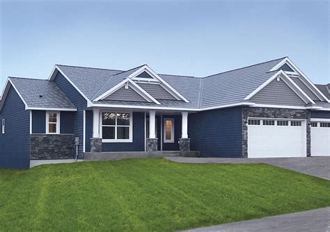 dark blue house with white trim and metal roof|blue metal roof interior.